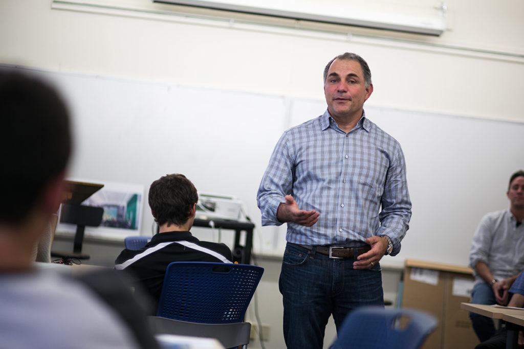 Tech CFO Mark Vranesh gives a talk to students in a classroom.