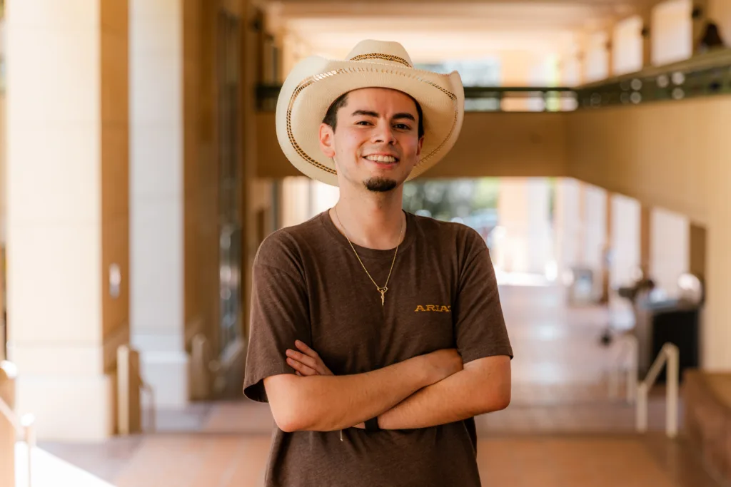 Humberto Mejia, poses outside the Orfalea College of Business