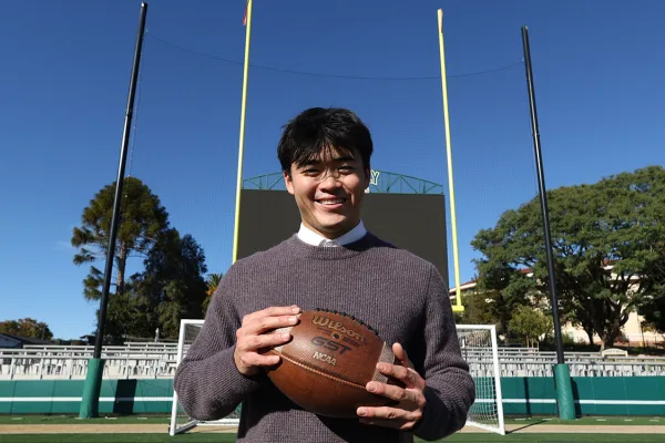 Spencer Zhang, on the football field at Spanos Stadium
